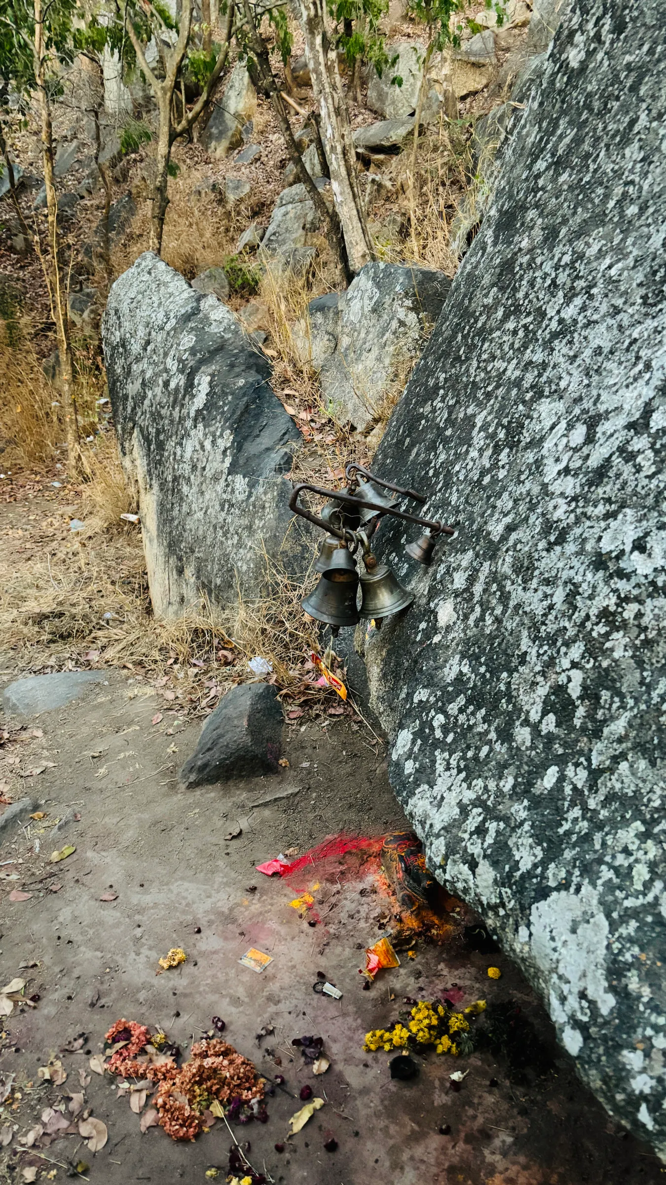 Bells tied to the rock at the Halu Chilume Gange temple