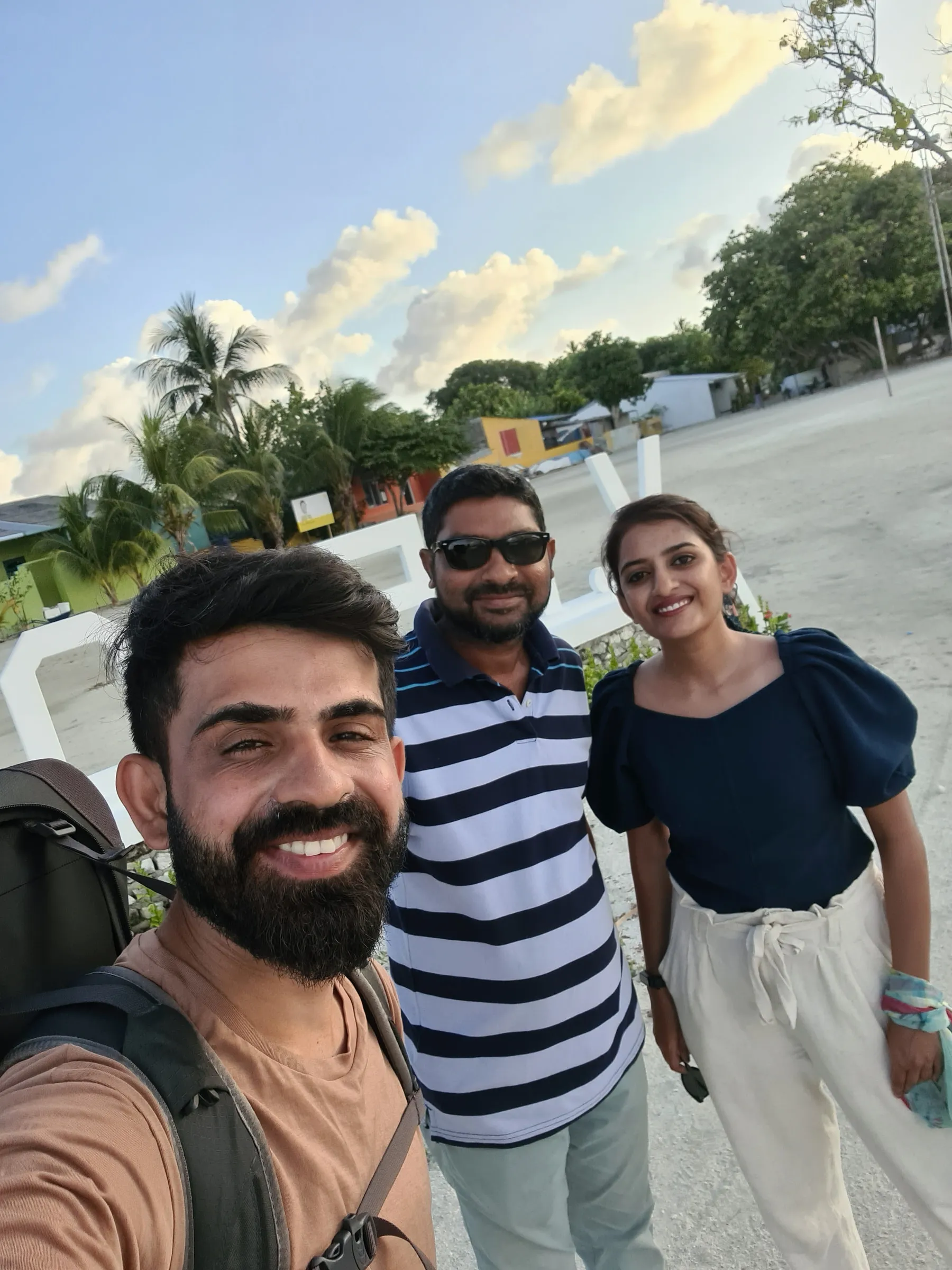 The two of us with the owner of Island Holiday Lodge on Keyodhoo